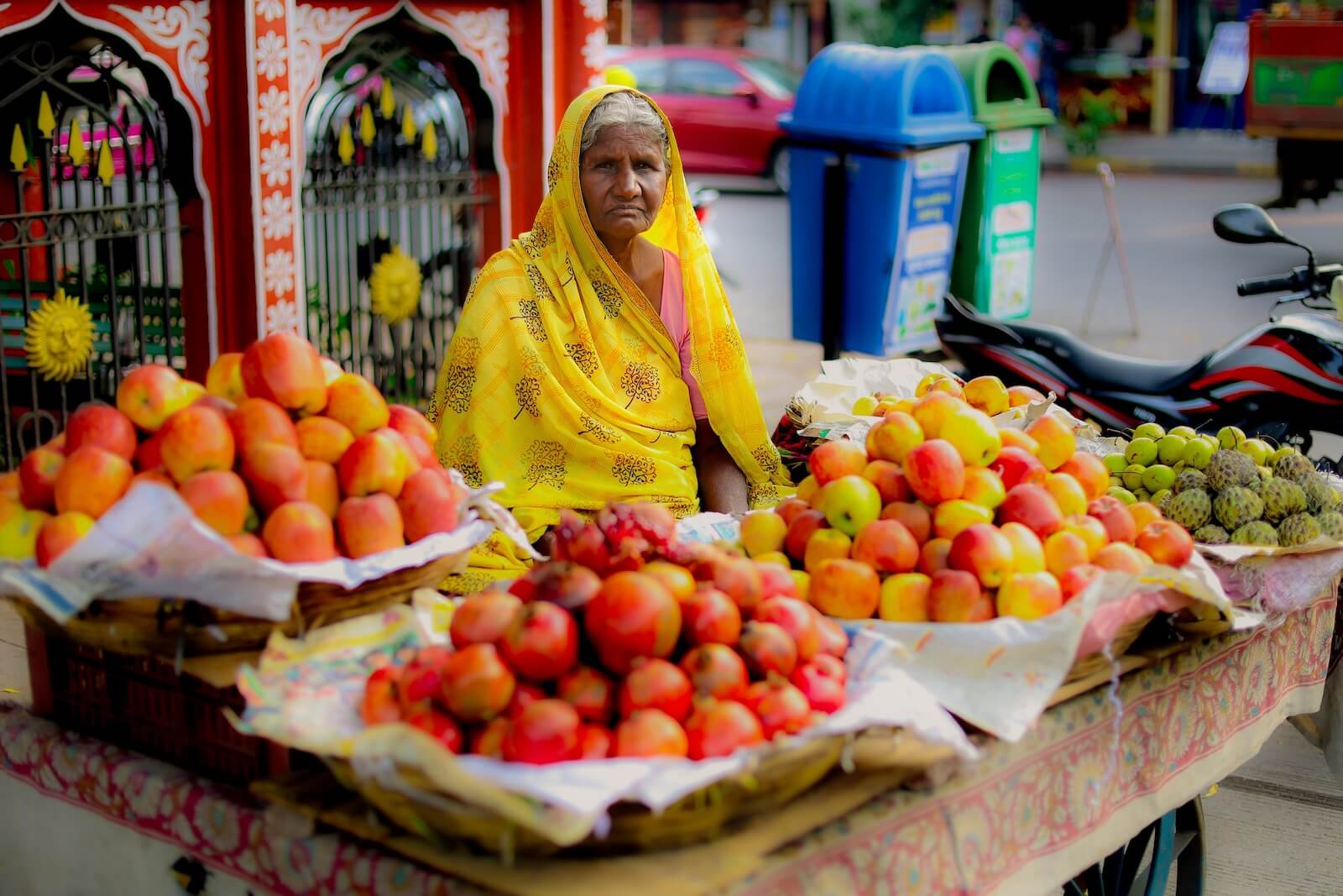 A lady selling fruits in India